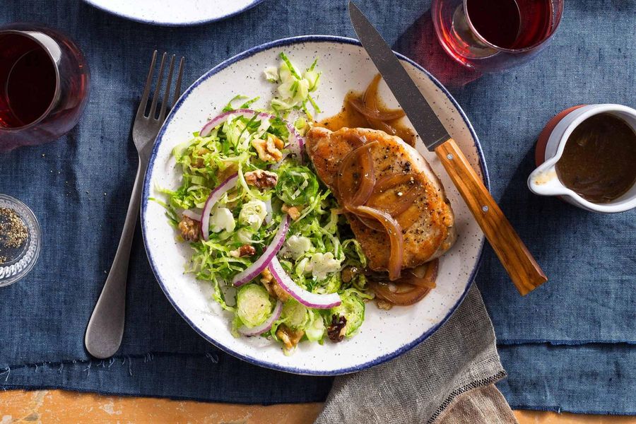 Pork chops and onion gravy with Brussels sprout slaw