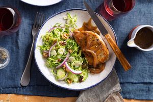 Pork chops and onion gravy with Brussels sprout slaw