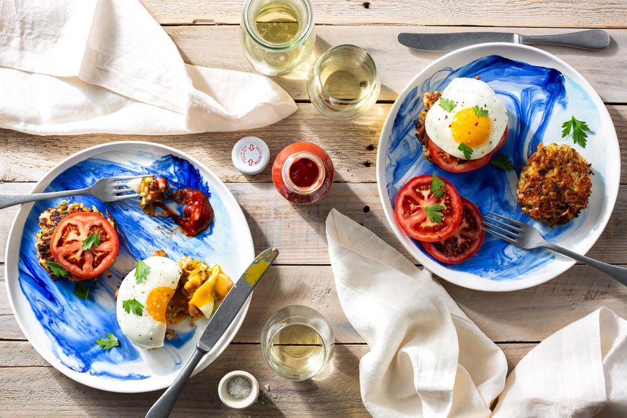 Maine fish cakes with fried eggs and tomato