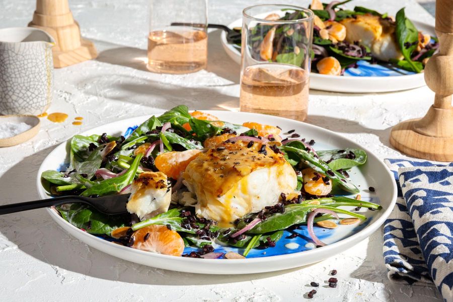 Miso-glazed halibut with citrus and black rice salad