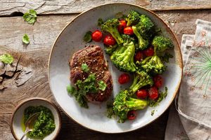 Steaks with chermoula, roasted vegetables, and pesto Available with top sirloins, Black Angus rib-eyes, and Black Angus filet mignons