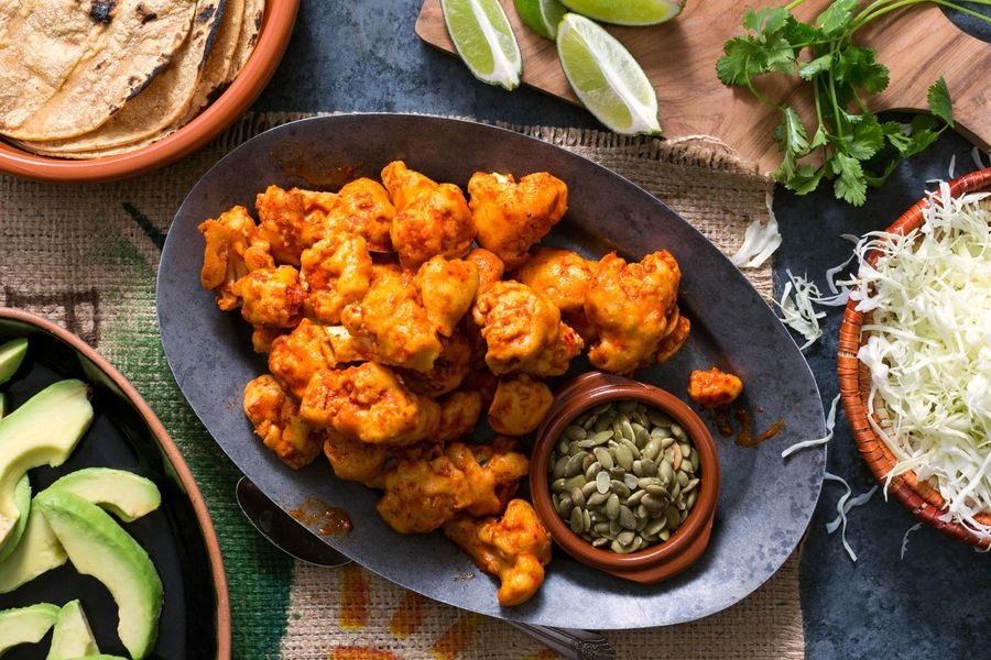 Roasted diablo cauliflower tacos with avocado and pumpkin seeds