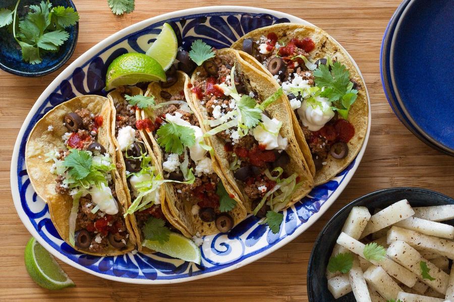 Fully loaded ground beef tacos with jicama sticks