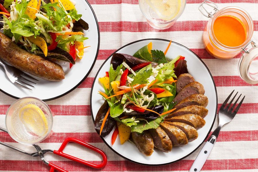 Italian sausages with insalata mista and red pepper vinaigrette