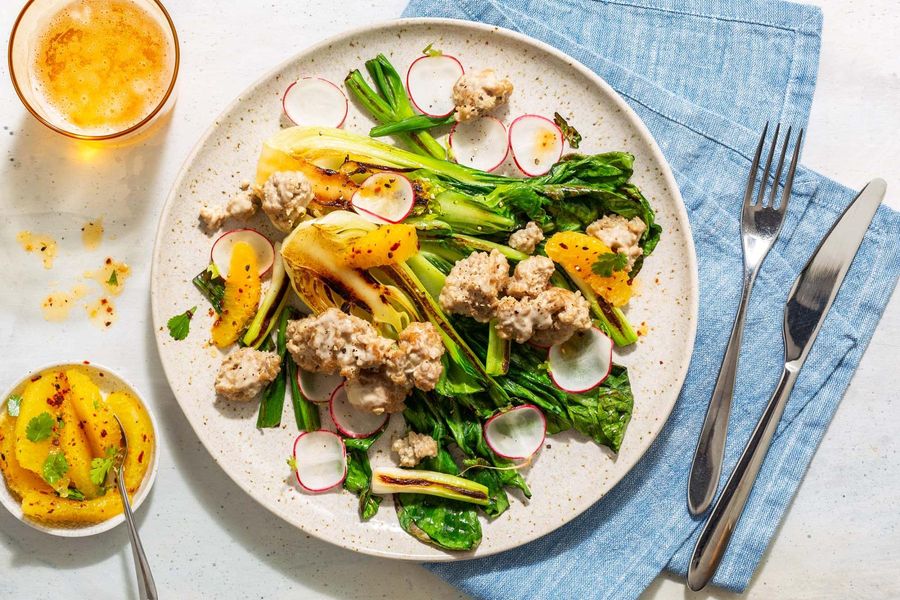 Your choice of protein with cashew-lime glaze, bok choy, and orange salsa