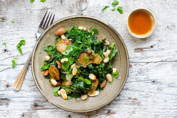 Warm sunchoke and kale salad with sprouted almonds