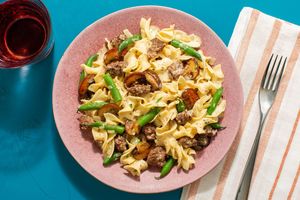 Beef stroganoff over egg noodles