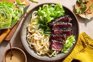Sesame-crusted tuna and fresh udon salad with basil and lemon