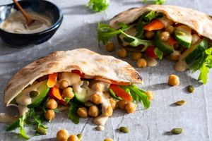 Chickpea and carrot pita pockets with cumin-lime tahini