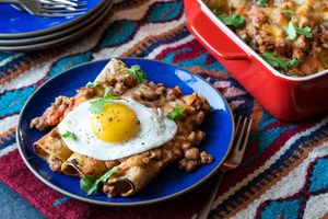 Southwestern enchiladas with sunny-side up eggs
