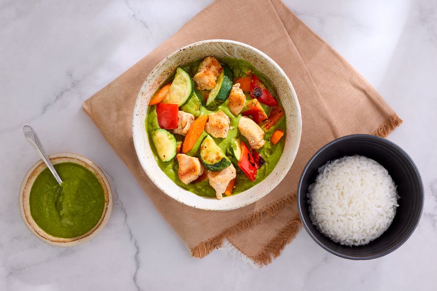Spicy Thai green curry with jasmine rice, zucchini, and bell pepper