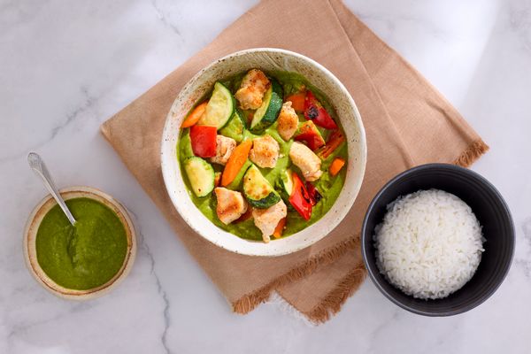 Spicy Thai green curry with shrimp, jasmine rice, and zucchini