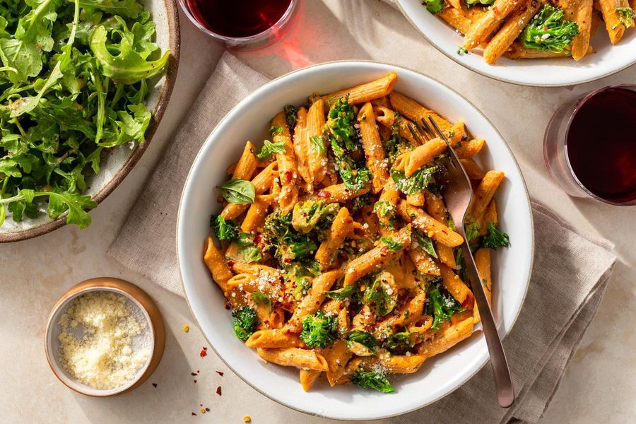 Fresh penne with red pepper–cashew crema and baby broccoli