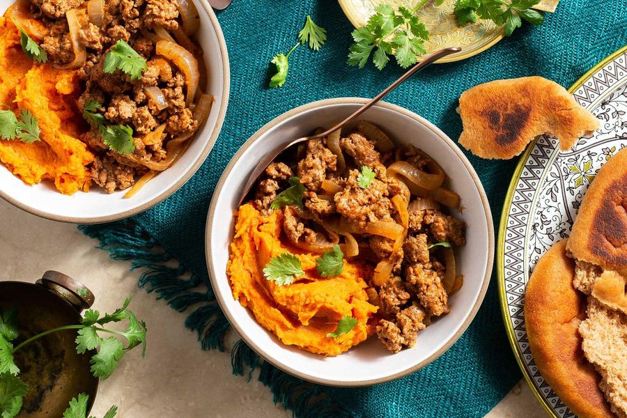 Lamb korma with sweet potato mash and toasted naan