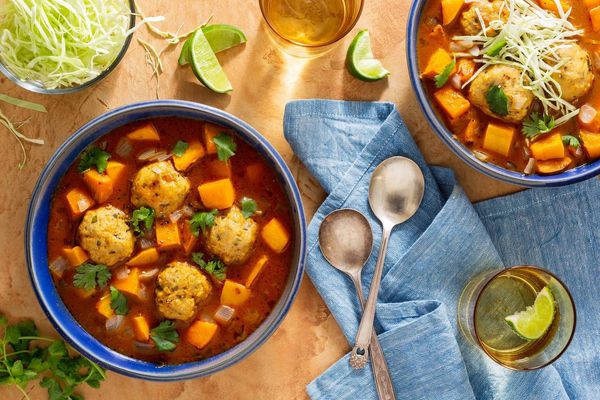 Spicy Mexican meatball soup with butternut squash, cabbage, and cilantro