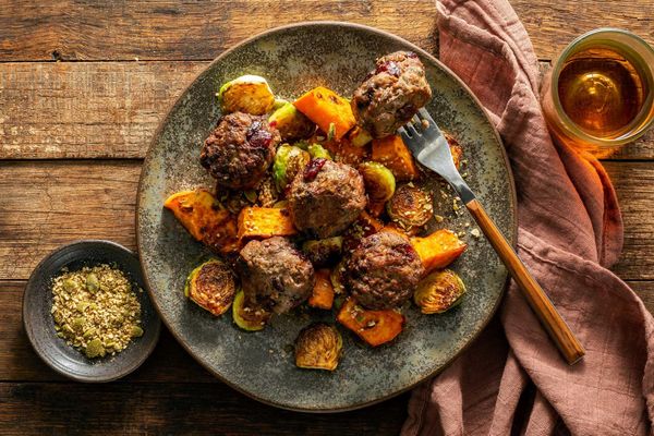 Turkey-cranberry meatballs with roasted Brussels sprouts and sweet potato