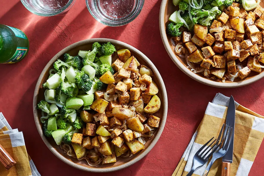 Mole-spiced potatoes and your choice of protein with romesco salad