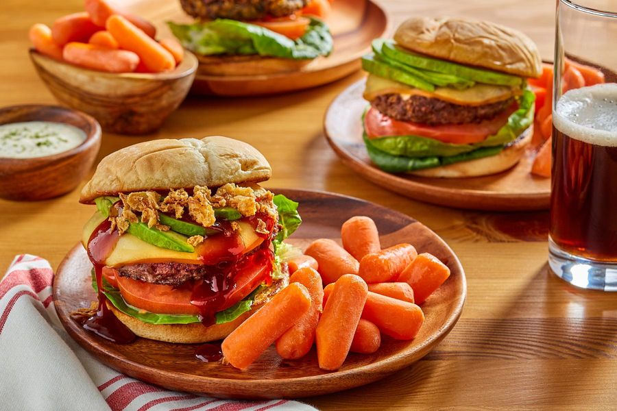 Smoky barbecue burgers with Gouda, tomatoes, and avocado for four