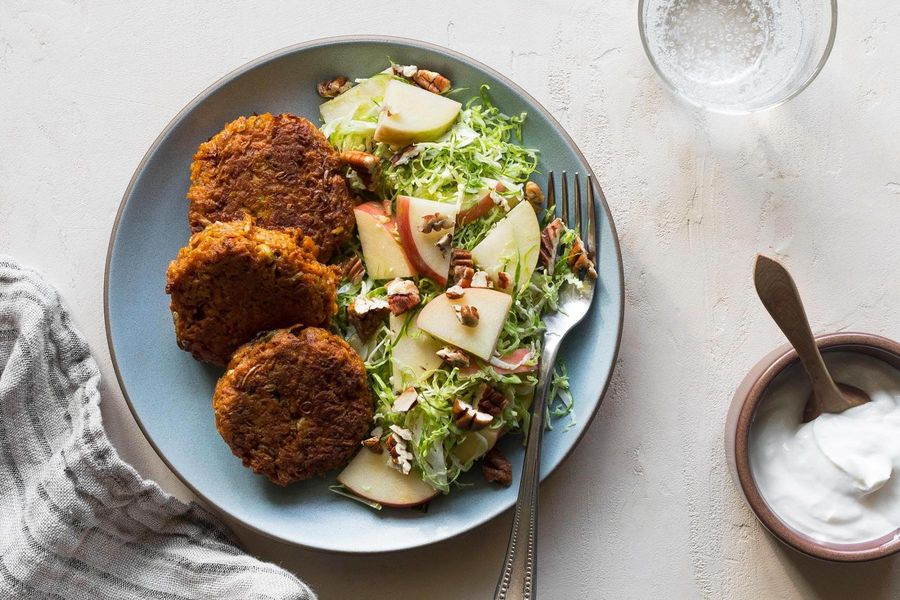 Sweet potato-scallion fritters with apple-Brussels sprouts slaw