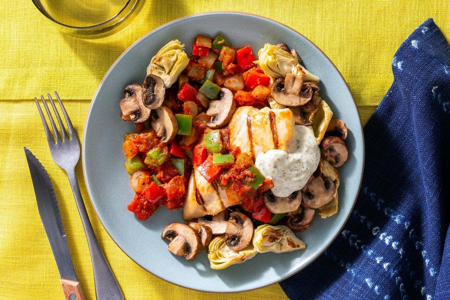 Basque chicken and peppers with mushrooms and lemon-parsley aioli