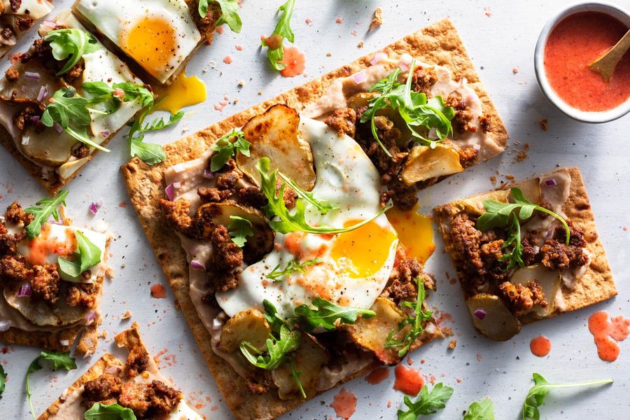 Chorizo flatbreads with sunchokes and sunny-side up eggs