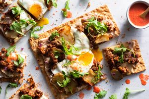 Chorizo flatbreads with sunchokes and sunny-side up eggs