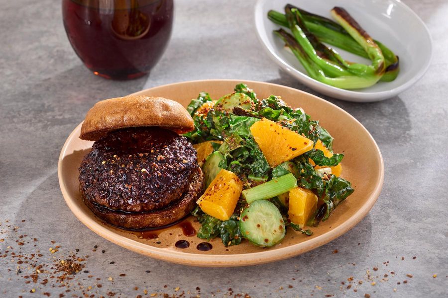 Teriyaki beef burgers with orange-kale salad and pickled cucumber