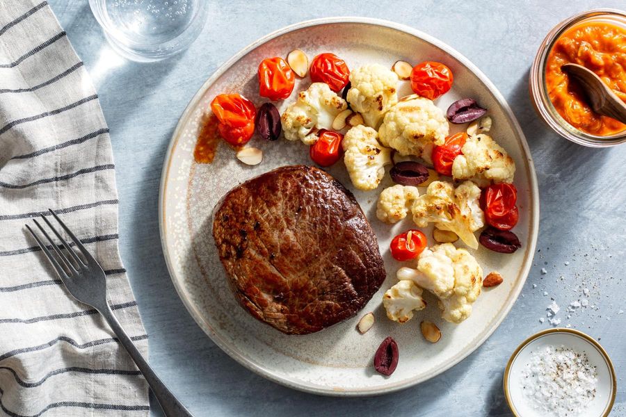 Seared steaks with roasted red pepper ajvar and cauliflower