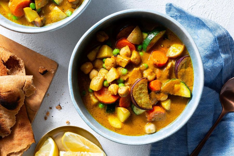 Golden sweet potato curry with chickpeas and whole grain naan