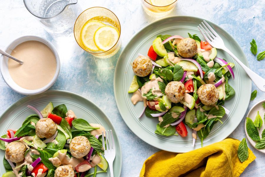 Greek salad with lemon-tahini dressing and your choice of protein