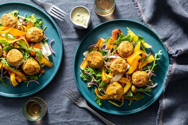 Chicken meatballs with caramelized onions and carrot-parsnip salad