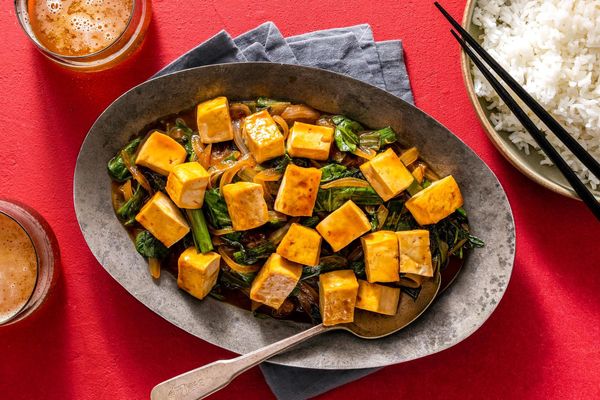 Mongolian beef and spinach stir-fry over steamed rice