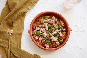 Latin chicken stew with white beans, green olives, and pumpkin seeds