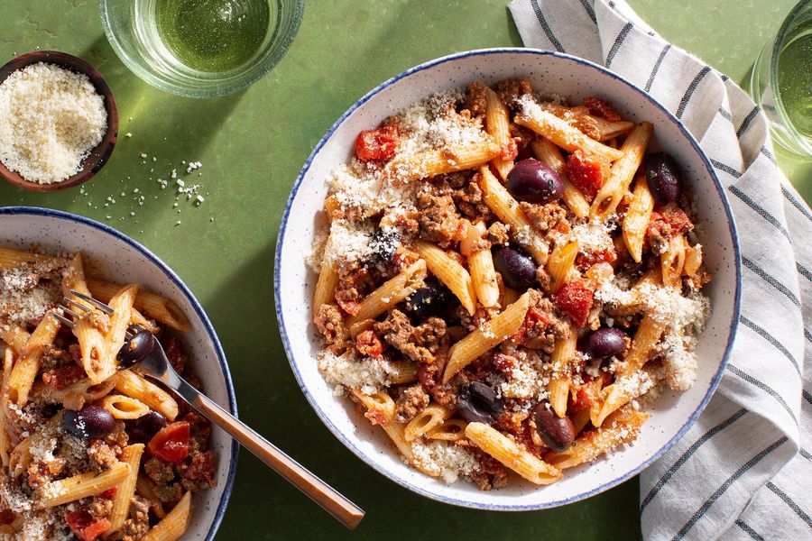 Penne with your choice of protein, tomato-olive sauce, and fresh ricotta