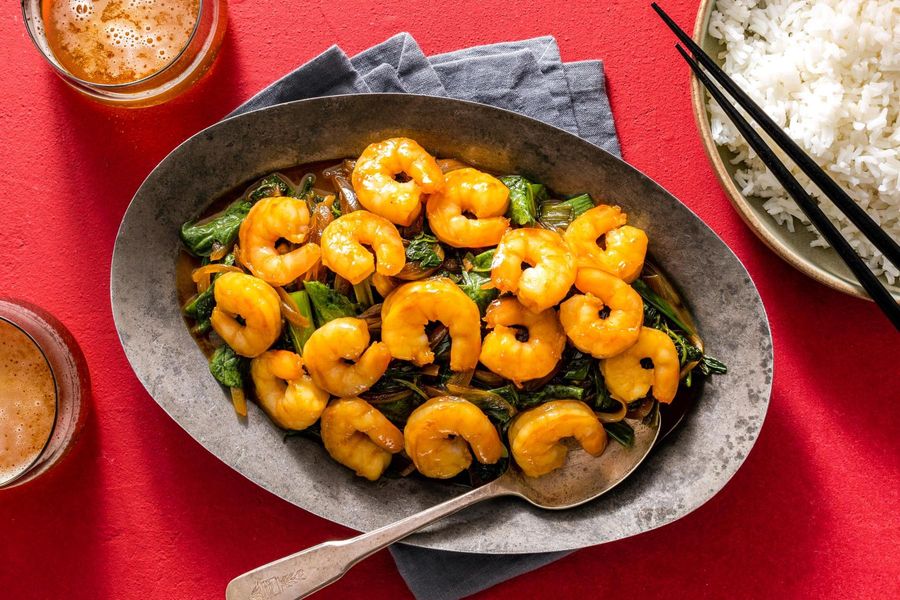 Mongolian stir-fry with spinach and scallions over steamed rice