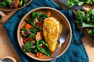 Orange-glazed chicken with broccoli rabe, carrots, and dates