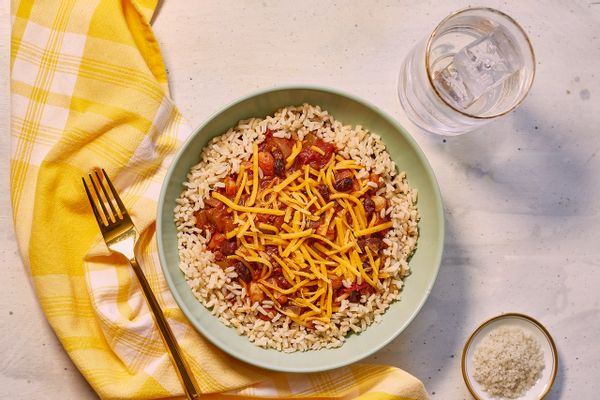 Three bean chili with brown rice and cheddar cheese