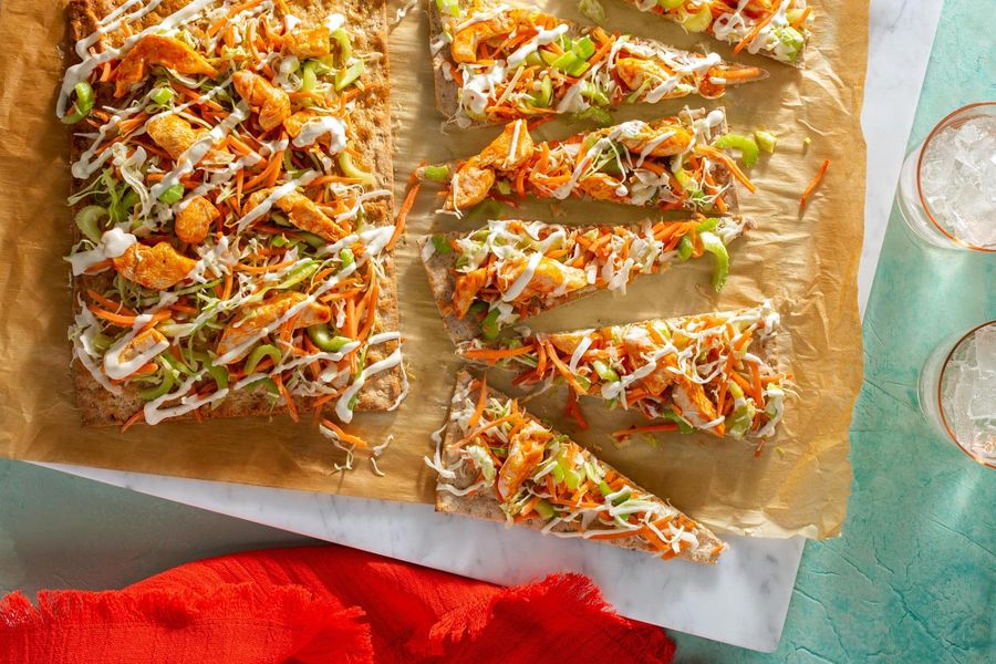 Buffalo chicken flatbreads with celery-carrot salad and ranch dressing