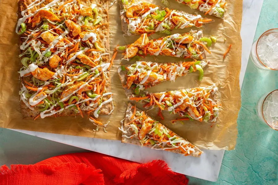 Buffalo chicken flatbreads with celery-carrot salad and ranch dressing