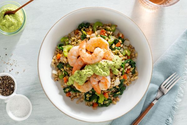 Salmon farro bowls with spinach and tahini goddess dressing