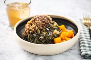 Maple shredded pork over braised greens