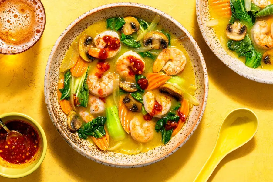 Lemongrass soup with baby bok choy, carrots, and mushrooms