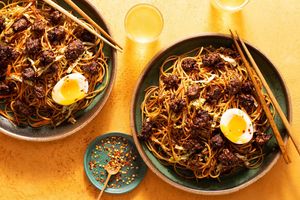 Pork lo mein with cabbage, black soybean sauce, and soft-cooked eggs