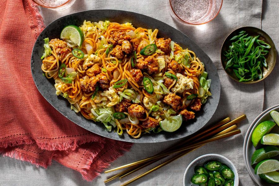 Mee goreng with your choice of protein, fresh ramen, and scrambled eggs