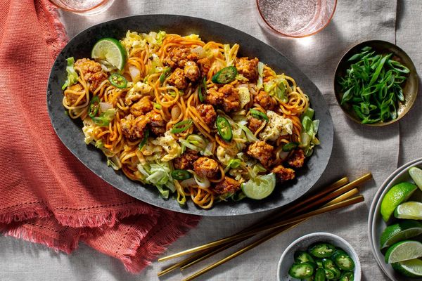 Pork mee goreng with fresh ramen, cabbage, and scrambled eggs