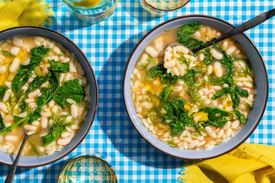 Greek Avgolemono soup with orzo, white beans, and fresh dill