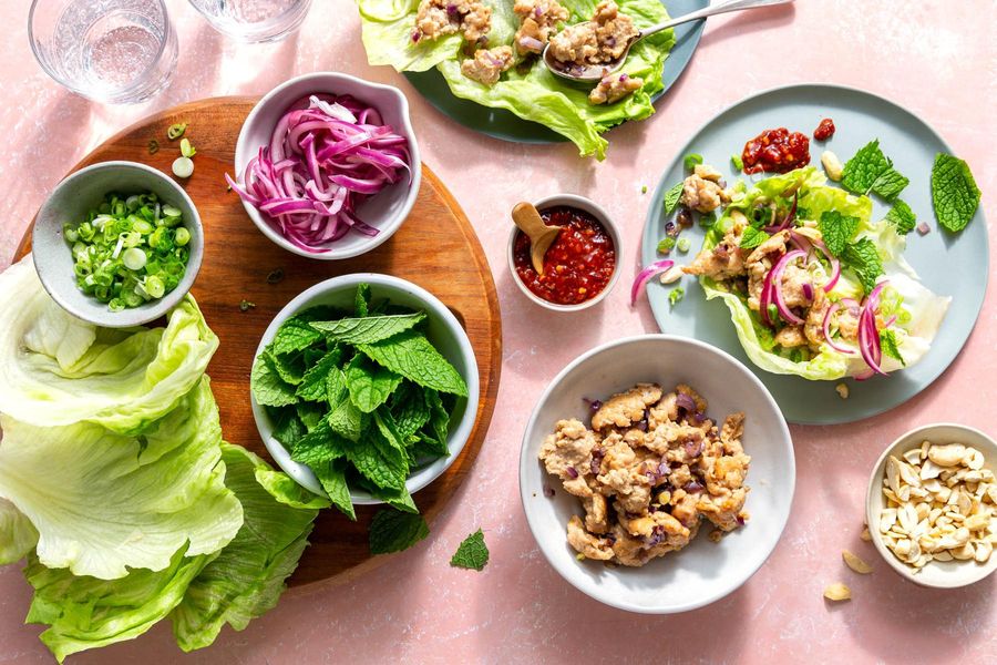 Thai chicken larb lettuce cups with scallions, cashews, and fresh mint
