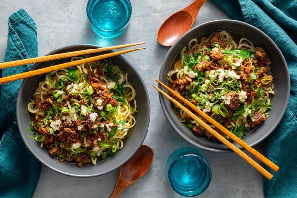 Taiwanese noodle soup with ground pork and baby greens
