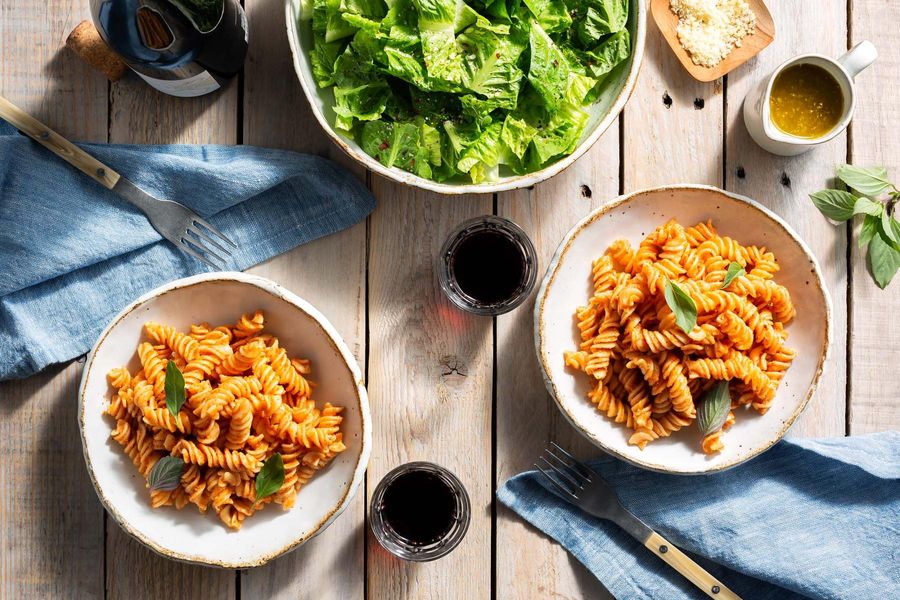 Pesto alla trapanese with fresh fusilli and Italian salad