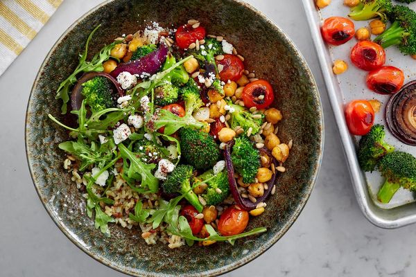 Roasted vegetable rice bowl with chickpeas and lemon-tahini dressing